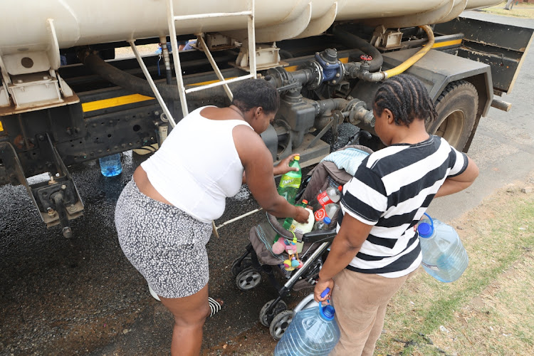 Water tankers distributing water to residents during the South Hills residents protest over water in Johannesburg.