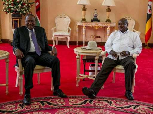 President Uhuru Kenyatta and his Ugandan counterpart Yoweri Museveni at Entebbe State House, November 19. /PSCU