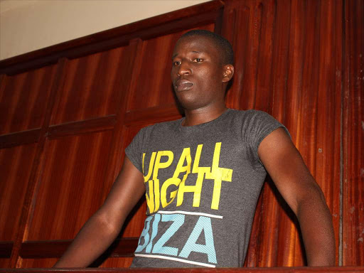 Blogger Cyprian Nyakundi at a Milimani law court on Monday,March 20 where he was fined sh 300,000 or serve four months in prison for disobeying court orders blocking him from defaming Safaricom CEO Bob Collymore./COLLINS KWEYU