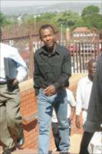 ACCUSED: Gift Leremi at the Randburg magistrates' court. PIc. Antonio Muchave. 14/03/07. © Sowetan.