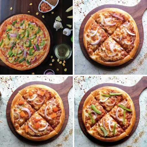 Veg Magic Box Of 4 Pizzas