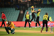 Australian players celebrates the win during the ICC Women's T20 Cricket World Cup semi final match between Australia and South Africa at Sydney Cricket Ground on March 05, 2020 in Sydney, Australia. 