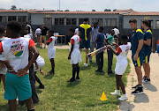 Australia senior men's cricket players visit Pumla School in Orlando in Soweto. 