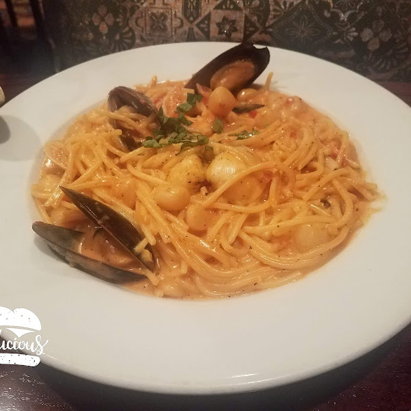 The gluten free seafood pasta in pink sauce. There were lots and lots of scallops, plenty of shrimp as well as some freshly cooked clams and oysters in their shells.  The sauce flavor was very tasty!