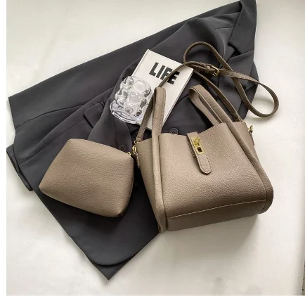 Retro Schultertasche, strukturierte tragbare Bucket Bag für Damen, ideal für Alltag oder Reisen. Bietet Platz und Stil.