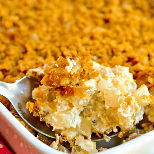 Budget-friendly, super easy, and delicious Funeral Potatoes are the perfect side dish for almost any meal. Bake a batch and take them to your next potluck or family reunion.