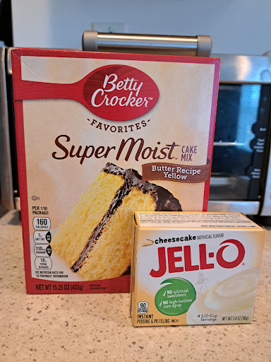 Picture of a cake mix and a box of pudding