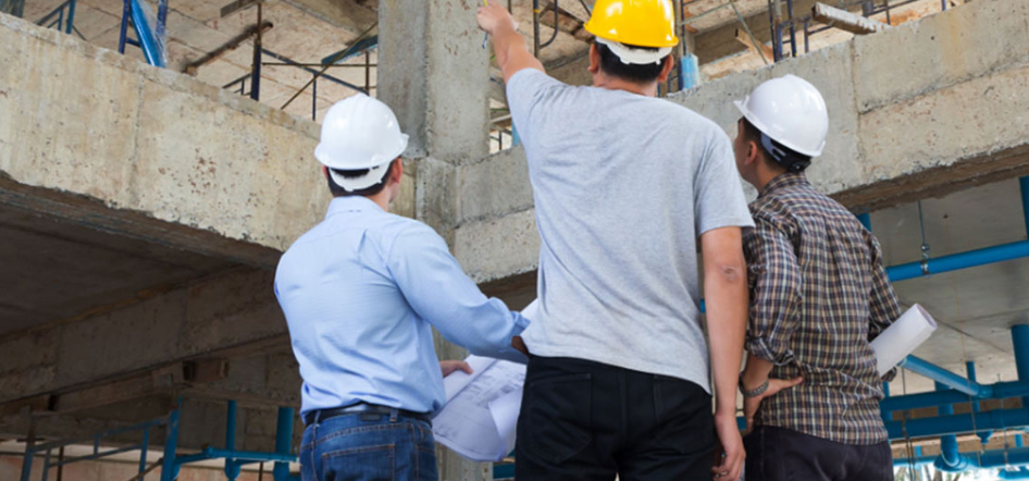 structural engineers analyzing loads on a commercial project