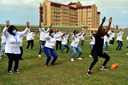 Dora Nginza nurses who survived after being infected with Covid-19 express their gratitude by performing the popular ‘Jerusalema’ dance outside the hospital on Wednesday
