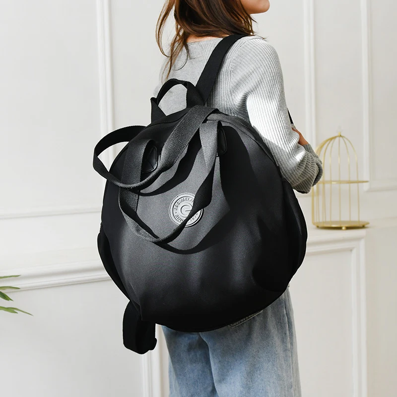 Bolsa Redonda Preta Feminina Grande Capacidade Mochila Ombro Mão Multifuncional Fashion para o Dia a Dia e Viagens