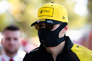 Renault F1 Team driver Esteban Ocon wearing a mask for protection against Coronavirus disease (COVID-19) at The Australian Formula One Grand Prix on March 12, 2020, at The Melbourne Grand Prix Circuit in Albert Park, Australia.