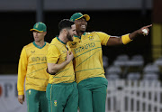 South Africa's Lungi Ngidi celebrates with Wayne Parnell after taking a catch to dismiss Ireland's Harry Tector off his bowling.
