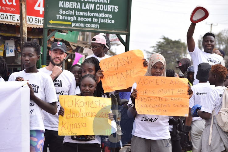 Youths during campaign dubbed 'Tusikubali kurudi back' called for peace and protection against any form of sexual and gender based violence on July 27, 2022.