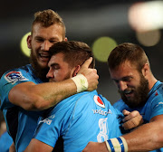  Nic de Jager of the Vodacom Bulls celebrates with teammates after his try during the Super Rugby match against the Cell C Sharks at Growthpoint Kings Park on June 30, 2017 in Durban, South Africa. 