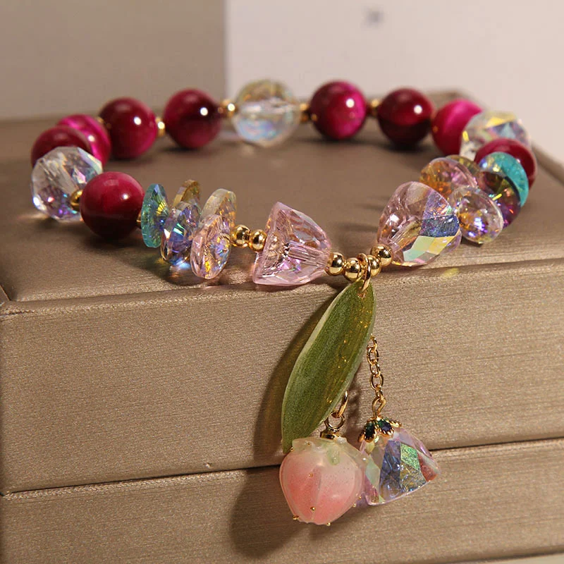 Bracelet en cristal Tigereye Vanves Stone Rouge Rose pour équilibre et protection, accessoire de mode élégant.