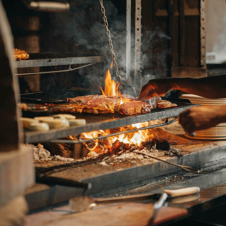 One of the highlights of CHE is the huge open fire that dominates the open kitchen.