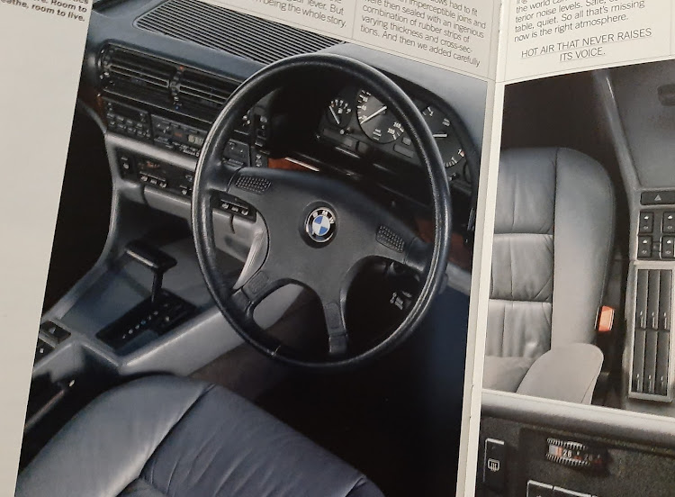 The vehicle's sumptuous grey interior reeks of success.