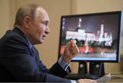 Russian President Vladimir Putin speaks during a meeting dedicated to the production of vaccines against the coronavirus disease via a video conference call at the Novo-Ogaryovo state residence outside Moscow, Russia, on March 22 2021. 