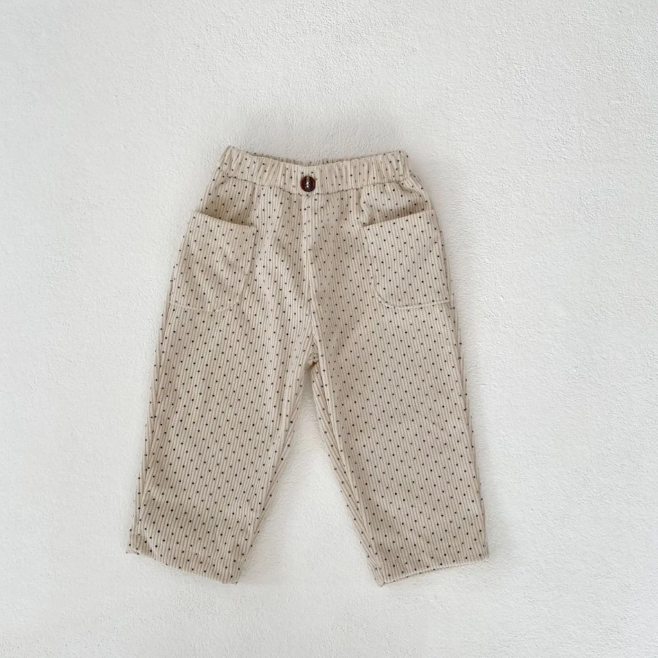 Pantalon décontracté ample en velours côtelé imprimé pour femmes. Confort et style décontracté pour un look quotidien, doux et polyvalent.