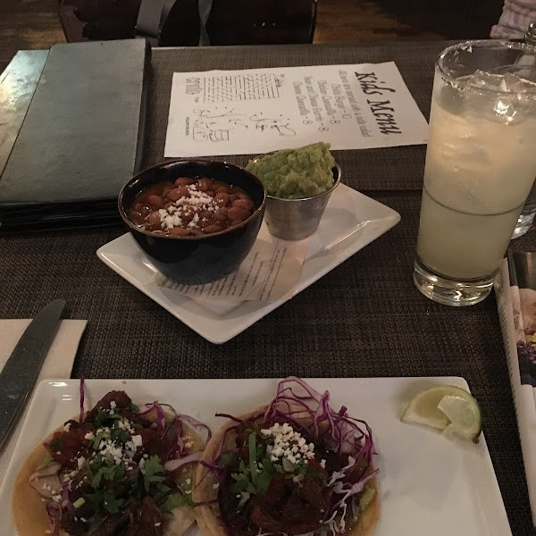 Carne asada tacos and pinto beans and avocado. All tacos and sides are a la carts. Super yummy