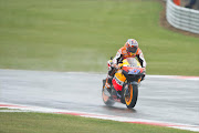 Casey Stoner of Australia and Repsol Honda Team heads down a straight during of the MotoGP race of MotoGp Of Great Britain at Silverstone Circuit on June 12, 2011 in Northampton, England