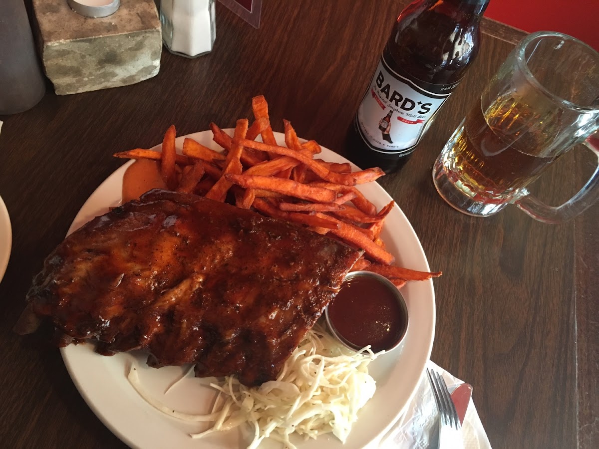 Half of rack with sweet potato fries and a bards gf beer