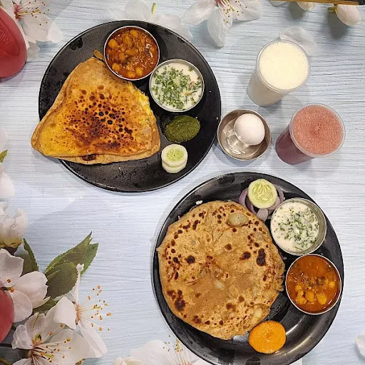 2 Egg Paratha + 2 Aloo Paratha+1 Lassi + 1 Juice