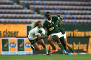 Yaw Penxe breaks away from Werner Kok during the Castle Lager Springbok Showdown match at DHL Newlands Stadium in CapeTown on October 03, 2020.