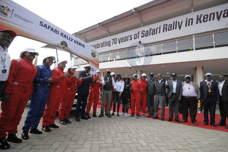 President William Ruto pose for a picture with all women Talanta Hela during the flag off of the 2023 WRC Safari Rally in Naivasha on June 21, 2023.