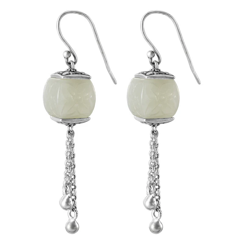 Lange oorbellen met Hetian jade Linglan patroon, een elegante toevoeging aan uw look. Perfect voor speciale gelegenheden.