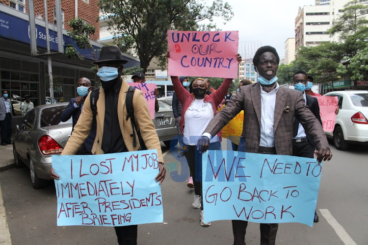 Entertainment and hospitality industry players during a demo to condemn government's order on closure of businesses at Nairobi CBD on March 31, 2021./ANDREW KASUKU