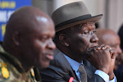 National police commissioner Khehla Sitole and police minister Bheki Cele. File photo.