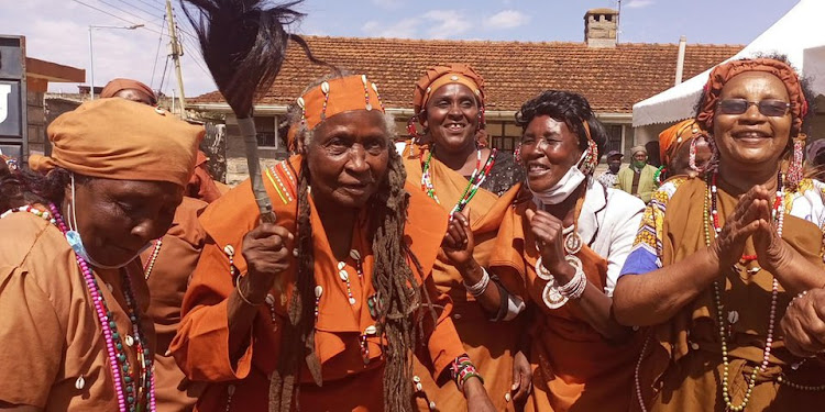 Mama Ngina during the shaving freedom fighter Muthoni's dreadlocks event.