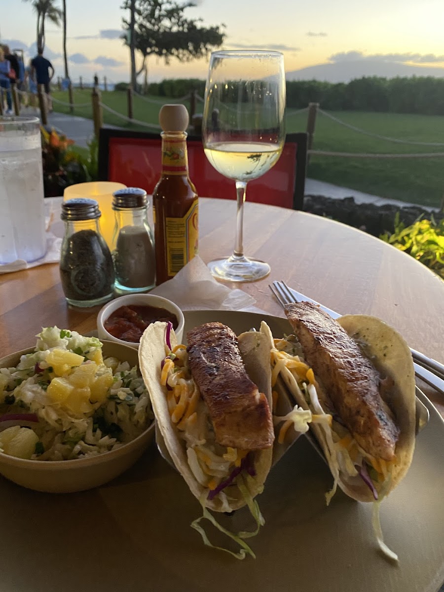 Fish tacos with side of cole slaw and a glass of vino... plus the sunset view!!
