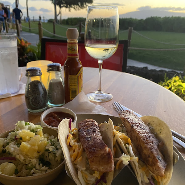 Fish tacos with side of cole slaw and a glass of vino... plus the sunset view!!