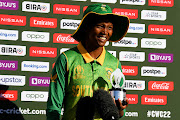 SA bowler Ayabonga Khaka poses with the Player of the Match trophy after the Proteas' victory in their 2022 ICC Women's Cricket World Cup match against Bangladesh.