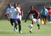 Ashley du Preez of Stellenbosch FC with Thembela Sikhakhane of AmaZulu. 