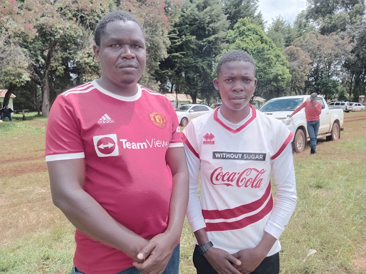 Itigo Girls coach Emmanuel Kogo with captain Marion Wafula in Kapsabet