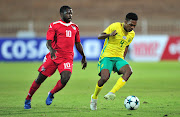 Gift Neo Links of Bafana Bafana dribbles away from Wangu Gome of Namibia during the Cosafa Cup plate semifinals match between Namibia and South Africa at Old Peter Mokaba Stadium, Polokwane on June 5 2018.