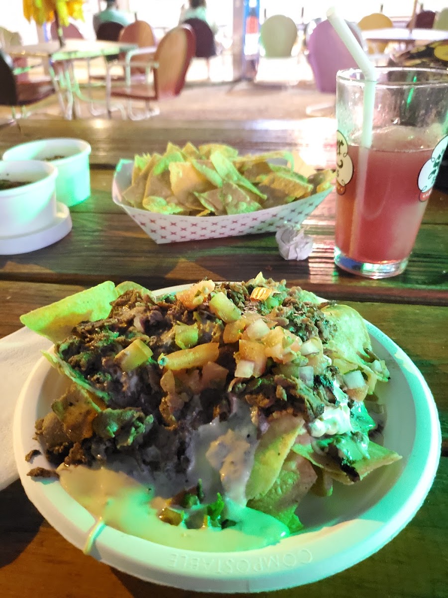 Steak nachos, chips and salsa, Pomegranate Limeade