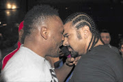 HEAD TO HEAD: David Haye of Britain and compatriot Dereck Chisora confront each other before a brawl during a news conference.  PHOTO: REUTERS