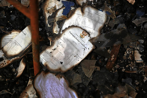 Charred remnants of pupils' national senior certificates survived the fire at Soshanguve Secondary School.