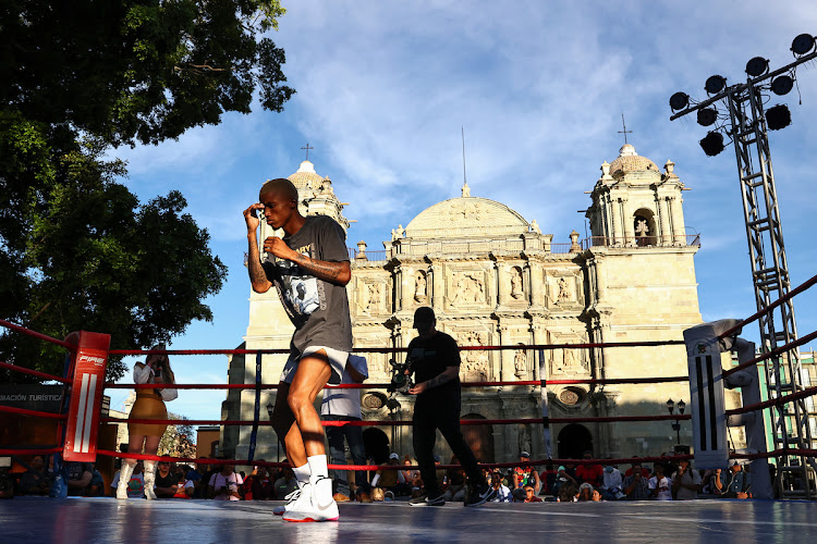 Sivenathi Nontshinga shadow-boxes during a media workout in Oaxaca.