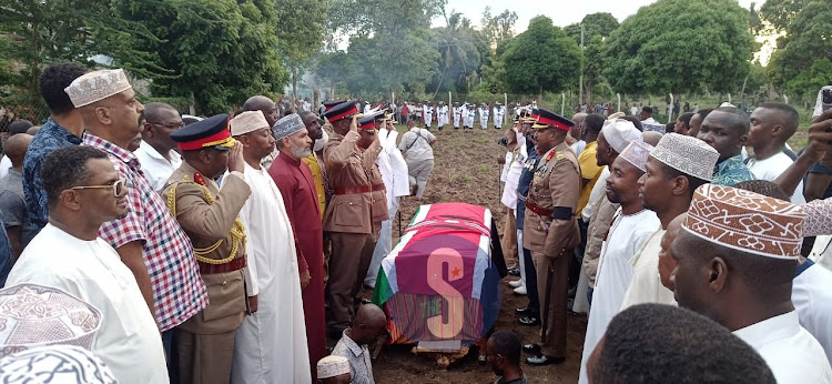 Mourners say final prayers during the burial of Brigadier Said in Kikambala, Kilifi County on Friday, April 19, 2024.