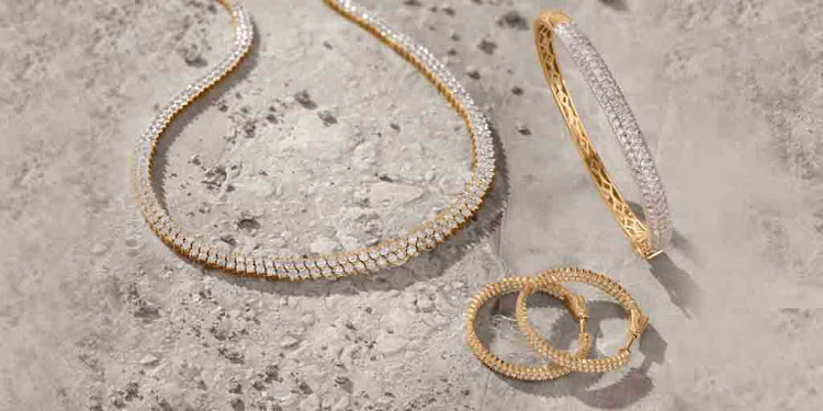 Exceptional pieces from American Swiss' Masterpieces collection: yellow gold 8ct diamond multirow necklace; R500,000, yellow gold 3.5ct diamond multirow bangle, R200,000; and yellow gold 2ct diamond double-row in-and-out hoop earrings, R96,000.