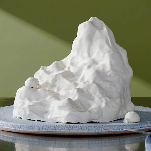 Image of a large iceberg-shaped chocolate that was made out of a mold created on the Mayku Multiplier