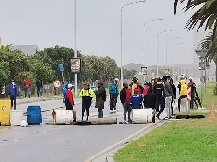 Students have barricaded the entrance to Nelson Mandela University's North and South campuses.