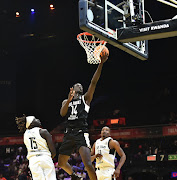 Mohamed Sylla of FUS Rabat leaps for the hoop in their Basketball African League match against Cape Town Tigers in Pretoria.