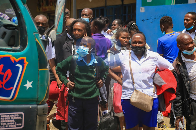 Students crowd bus stations to seek means of transport to various schools for their second term education on October 12, 2021./WILFRED NYANGARESI