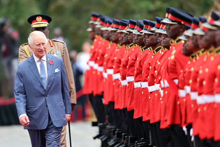 King Charles III walks past a guard of honour during the ceremonial welcome at State House in Nairobi, Kenya, on Tuesday. Picture: GETTY IMAGES/CHRIS JACKSON